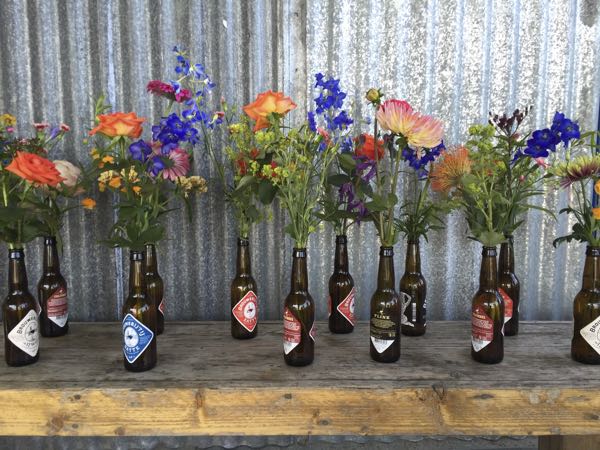 Flowers in beer bottles
